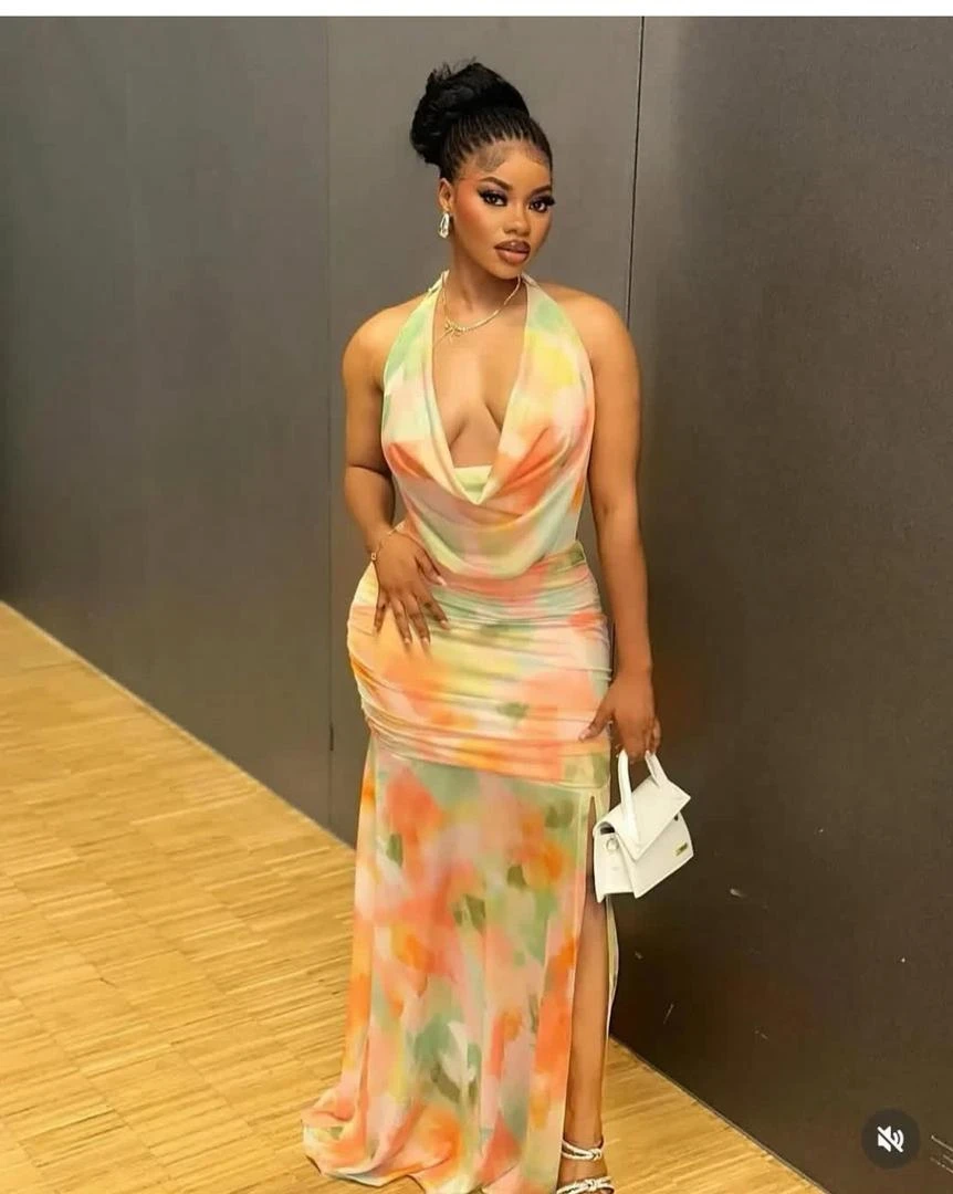 halter-neck draped maxi dress.